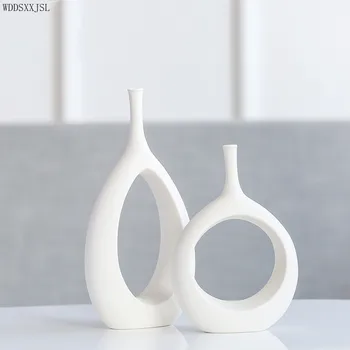 Simplicidade moderna e branco oco do vaso decoração cerâmica artesanato de presente de natal em casa sala de estar, mesa de jantar vaso decoração