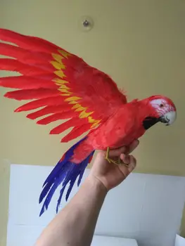 grande simulação vermelha de papagaio de brinquedo de plástico e de peles asas do papagaio modelo dom sobre 60x40cm
